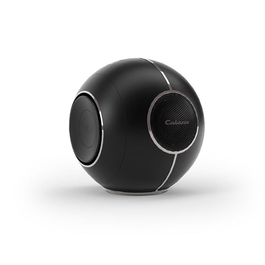 The Cabasse The Pearl Myuki Active Speaker by Cabasse is a black, spherical, high-resolution connected speaker with metallic accents and mesh front, featuring a sleek modern design that delivers powerful sound.
