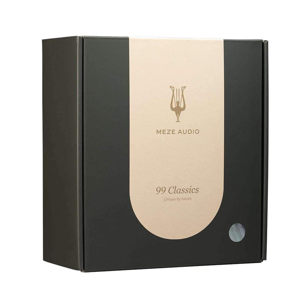 A black box with a beige label showing the Meze logo and "99 Classics Unique by nature" hints at the refined acoustic balance of the walnut-wood Meze Audio 99 Classics V2 Headphones.