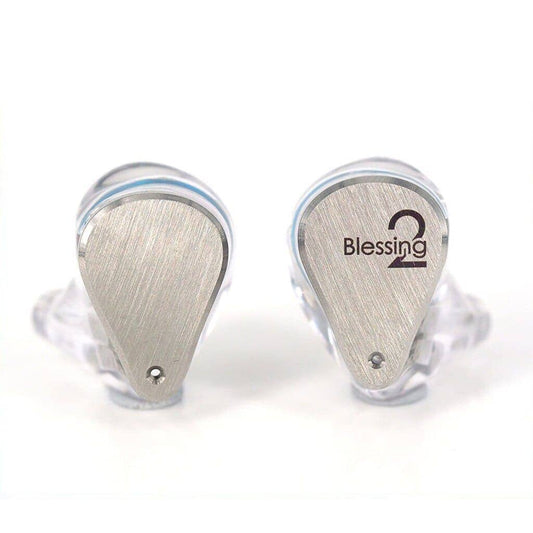 A pair of clear Moondrop Blessing 2 In-Ear Headphones by Moondrop with brushed metal faceplates, one engraved Blessing 2, are shown upright side by side against a white background. (Open Box).