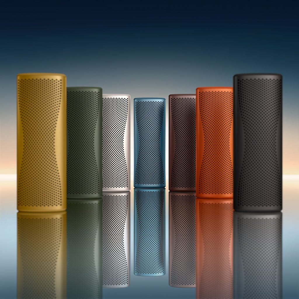Seven KEF Muo HiFi Portable Bluetooth Speakers by KEF in assorted colors stand upright on a reflective surface against a gradient blue background, blending bold style with high-quality portable sound.
