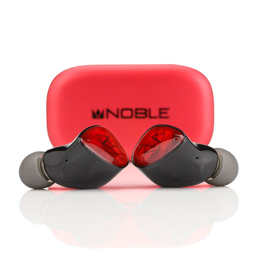 Two black and red Noble Audio FoKus Amadeus True Wireless In-Ear Headphones with dynamic drivers are placed before a bright red charging case with NOBLE and its logo in black, set against a white background.