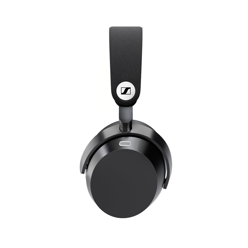 Overhead view of a single Sennheiser Momentum 5 Wireless Headphone, featuring a round earcup, rectangular padded headband, and visible Sennheiser logo. Premium wireless noise cancelling headphones are showcased against a white background.