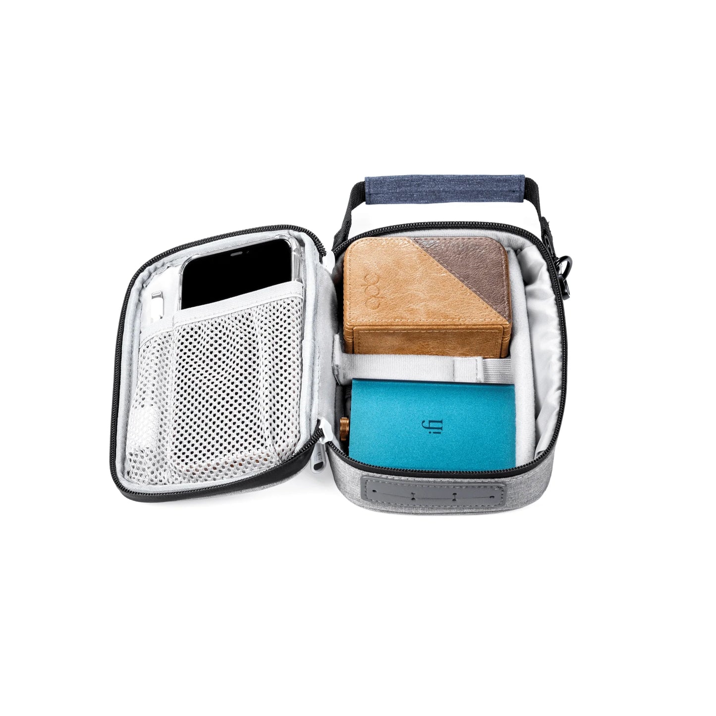 The iFi Audio iTraveller Carry Case - Clearance by iFi Audio features a mesh pocket for your smartphone and compartments for a wallet and notebook, making it perfect for carrying audio accessories or portable DACs.
