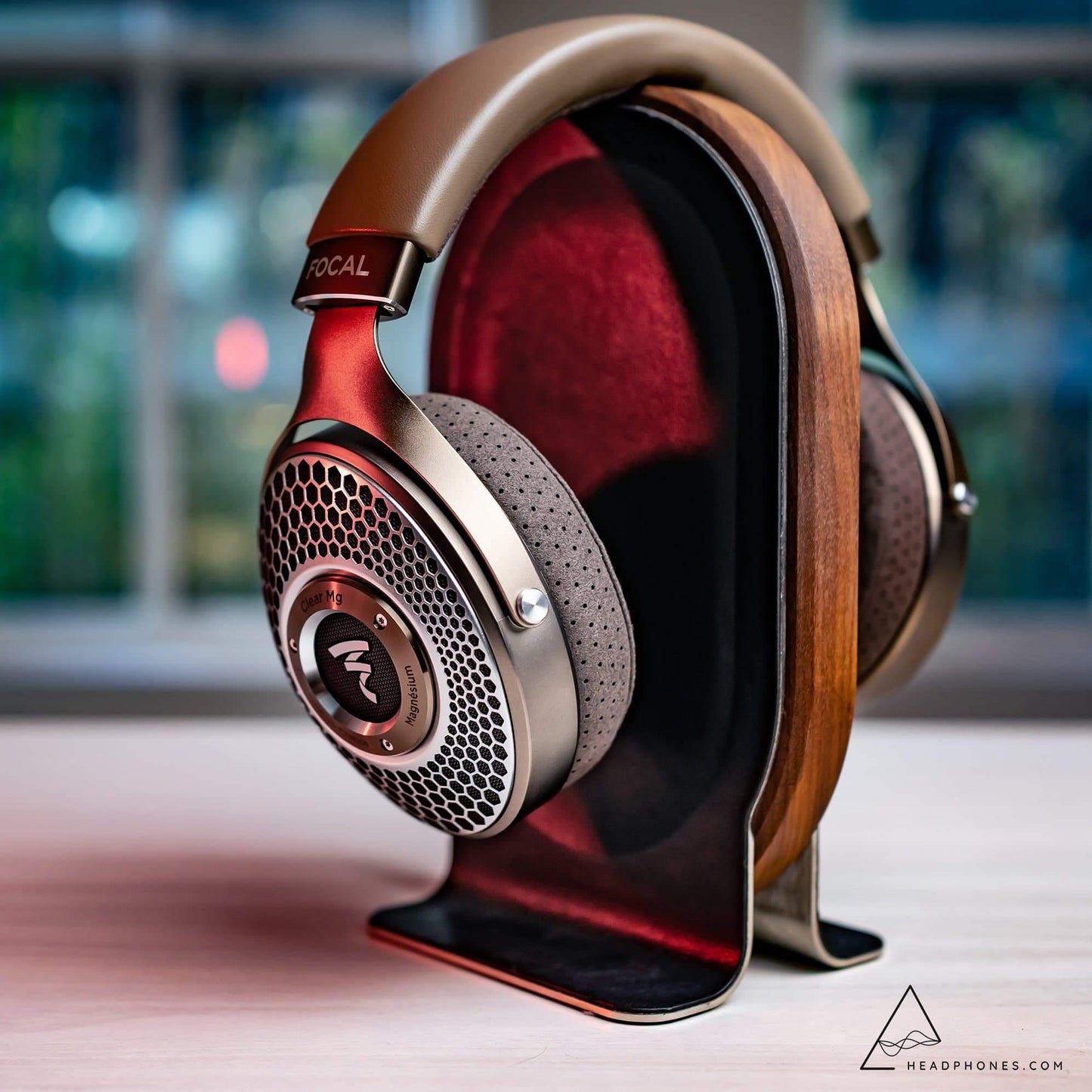 Focal Clear Mg Dynamic Open-Back Over-Ear Headphones on Woodgrove headphone stand | Available to purchase on Headphones.com