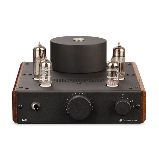 The Feliks Audio Echo MK II by Feliks Audio is a black tube amplifier with wooden side panels, four vacuum tubes on top, and a central control knob on the front, highlighting its OTL design. It is shown against a white background.