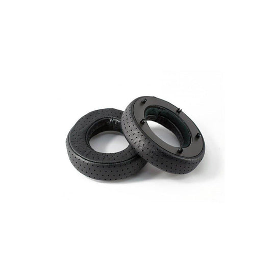 Two black, round Focal Utopia Ear Pads by Focal, featuring visible stitching and a perforated design for comfort and premium sound, are shown on a white background—ideal for high-end headphones.